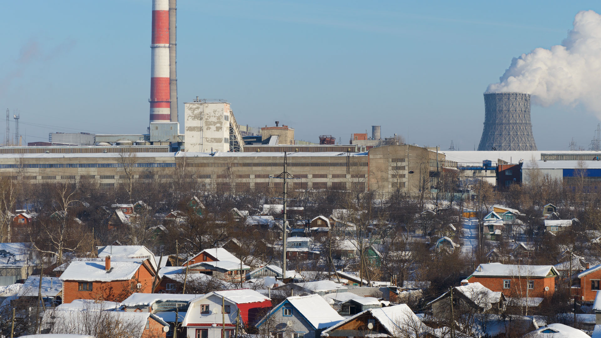 Blighted neighborhood near industrial power generation plant